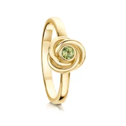Reef Knot Peridot Ring In 9ct Yellow Gold